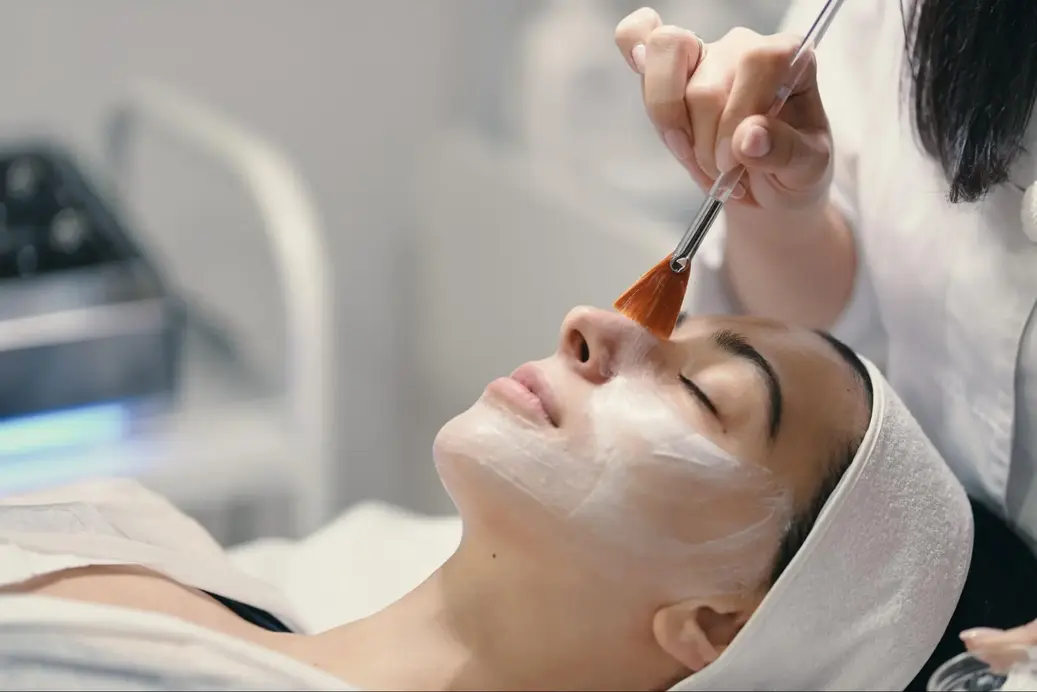 dermatologist performing facial treatment in Kannur at primeskin clinic